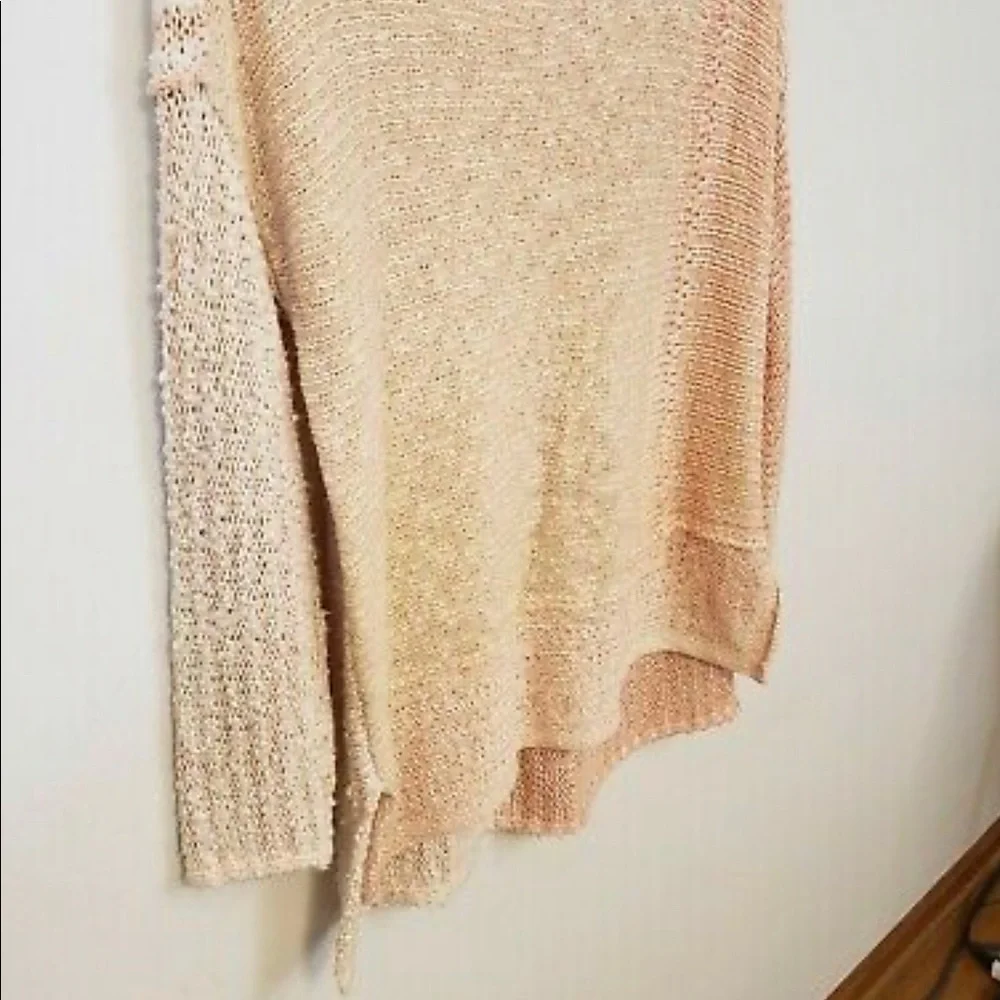 Free People pink and white knit sweater with side skits size medium